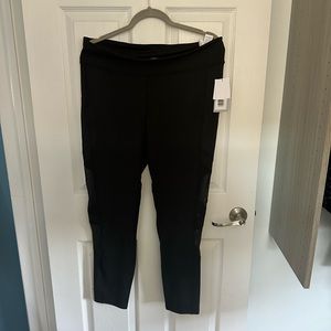New black super soft leggings with see-through sides.
